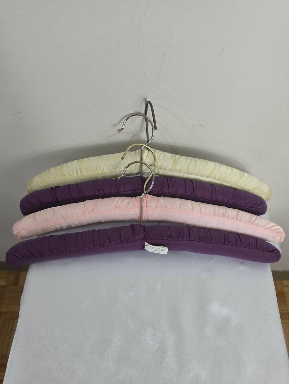 Set of 4 Padded Fabric Hangers in Purple, Pink, and Cream